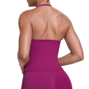 Magenta high-strength sports bra with halter neck and open back design for yoga fitness