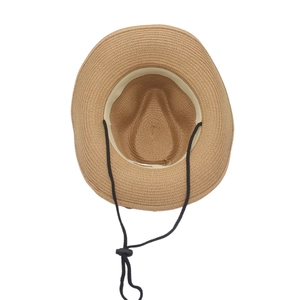 Brown straw cowboy hat with adjustable windproof strap and woven spiral texture for outdoors