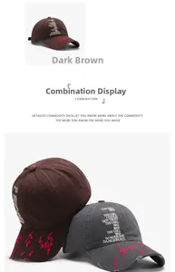Close-up of distressed cotton baseball caps with vintage embroidery in dark brown and gray