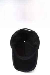 Detail of winter baseball cap showing thick wool lining and adjustable ear flaps