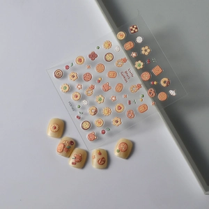 3D embossed nail stickers featuring cute bear cookies and flowers on warm yellow finish
