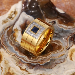 Gold stainless steel wide ring for women featuring a square blue zircon center stone