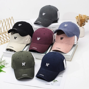 Vintage washed cotton baseball caps with N embroidery in eight different colors