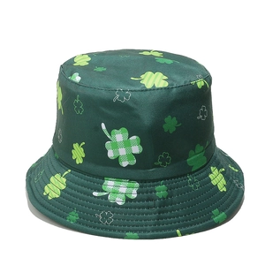 Close-up of St. Patrick's Day bucket hat with green shamrock and clover patterns