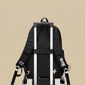 Black school backpack with luggage strap and durable nylon fabric for travel utility