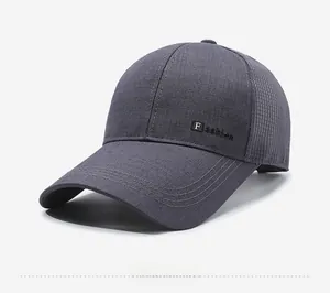 Macro shot of dark grey mesh baseball cap detailing fabric texture and Fashion label
