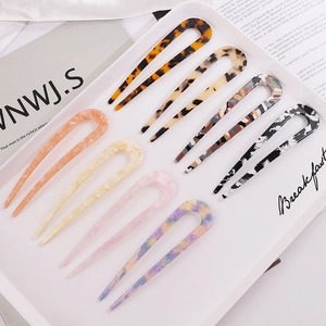 Minimalist acetate hairpins set with tortoise shell and marble patterns in various colors