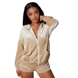 Detail of khaki velvet hoodie and shorts set with soft fabric texture and zipper closure