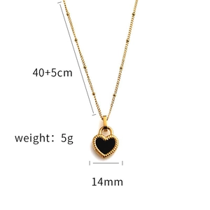 Detail showing dimensions of 14mm black heart pendant on a 40cm golden necklace chain
