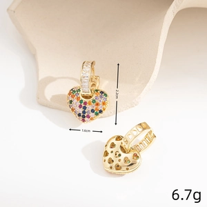 Macro detail of gold heart earrings with colorful zircons and镂空 heart back design