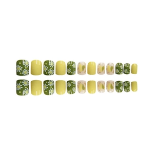 Short square press-on nails with yellow finish and green daisy floral patterns