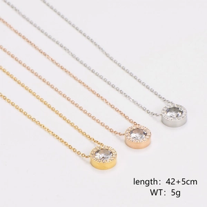 Bow heart pendant necklace set in gold, rose gold, and silver finishes with crystals