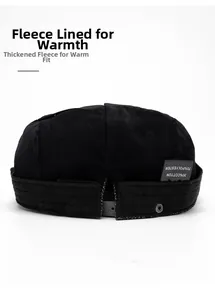 Close-up of fleece lining and fabric material details on the warm black miki hat