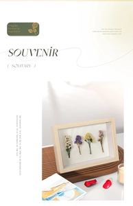Detailed view of 3D hollow wood frame featuring various dried flower specimens for DIY decor