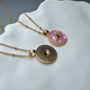 Gold evil eye necklace set with pink crystal zircon and shell charms for women