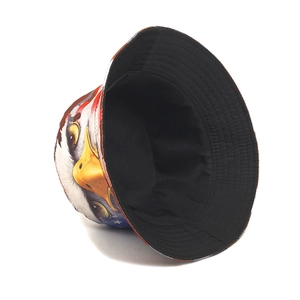 Reversible bucket hat featuring realistic eagle and American flag digital print designs