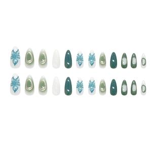 Green lily press-on nail kit with abstract polka dots and silver metal ring accents