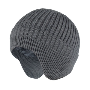 Detail of grey winter knit beanie featuring soft fleece lining and warm ear protection