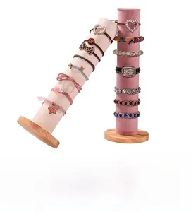 Présentoir à bijoux en velours rose et beige avec base en bois pour chouchous