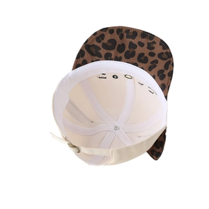 Toddler baseball cap with leopard print brim and beige crown showing inner lining detail