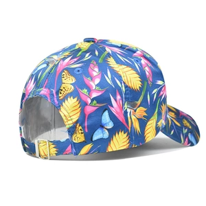 Detail of tropical floral baseball cap showing rear view with silver metal buckle strap