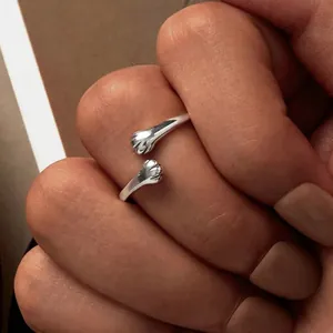 Adjustable 925 sterling silver ring featuring cute cat paw prints and hug design for women