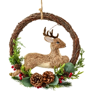 Nordic Christmas wreath with straw deer, pine cones and berries on a natural vine ring