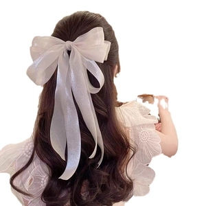 Elegant large white organza bow hair clip with long ribbons for a graceful look