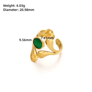 Detail view of gold floral ring with green stone showing 4.03g weight and dimensions