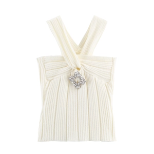 White ribbed knit halter top featuring a diamond rhinestone brooch and cross tie detail