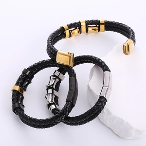 Men's braided black leather bracelet set with polished gold and silver magnetic clasps