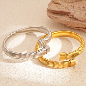 Minimalist metallic snake-style elastic open bangles in gold and silver finishes