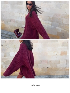 Close-up of true red oversized cable knit sweater with chunky vintage texture