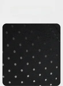 Close-up of black breathable mesh fabric with ventilated round holes for summer hip hop caps
