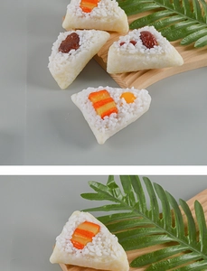 Detailed view of PVC glutinous rice dumpling models with realistic grains and toppings