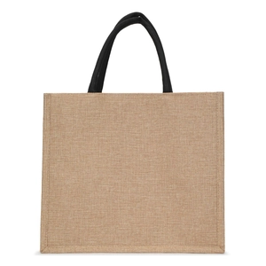 Macro detail of natural jute fabric texture and black rope handle on a large tote bag