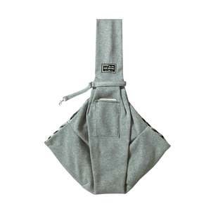 Detail of grey pet sling bag with knit cotton fabric and inner black-white checkered lining