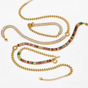 Detail of gold Cuban link chain with square colorful zircon stones and OT buckle closure