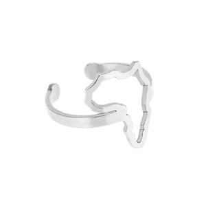 Macro detail of the polished silver Africa map outline on a minimalist adjustable open ring