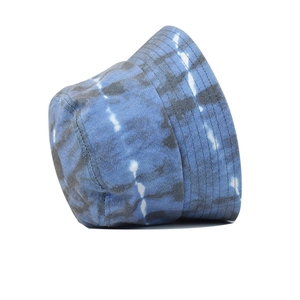 Blue-grey tie-dye cotton bucket hat for men and women featuring a wide reinforced brim