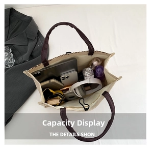 Top view of large linen tote bag showing interior storage for tablet, umbrella and daily items