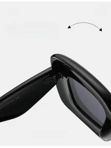 Detail of durable metal hinge and CE certification stamp on Y2K black sunglasses