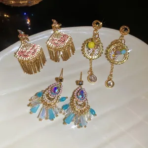 Ethnic bohemian drop earrings with fans, tassels and colorful gemstone charms for women