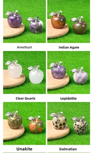 Macro display of assorted mini apple pendants in amethyst and natural gemstones