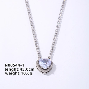 Macro view of silver heart tennis necklace with 45cm length and 10.6g weight specs