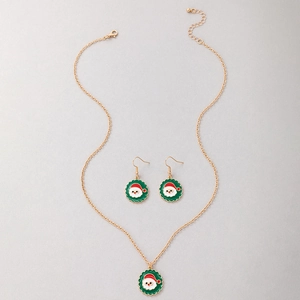 Christmas jewelry set with Santa Claus enamel earrings and necklace on gold metal