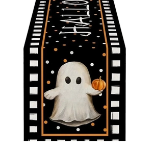 Halloween table runner featuring a cute ghost and pumpkin design with polka dots