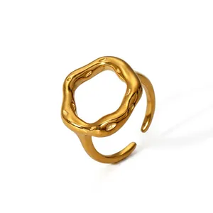 Detail of irregular wave texture gold ring with 19mm width and adjustable opening