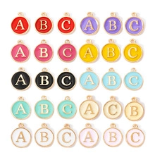 Detailed grid of colorful alloy enamel letter charms A, B, C for DIY jewelry making