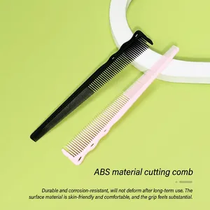 Professional ABS hair cutting comb set in black and pink with anti-slip wave handle